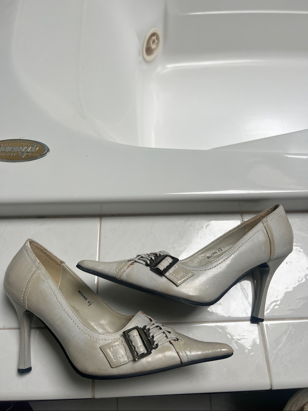 Charlotte Russe grayish pointed-toe heels featuring a distinct decorative buckle